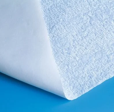 Bettschutzeinlage mit Frotteebeschichtung